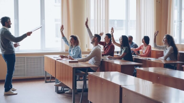 Students participating in a classroom discussion without relying on individual devices