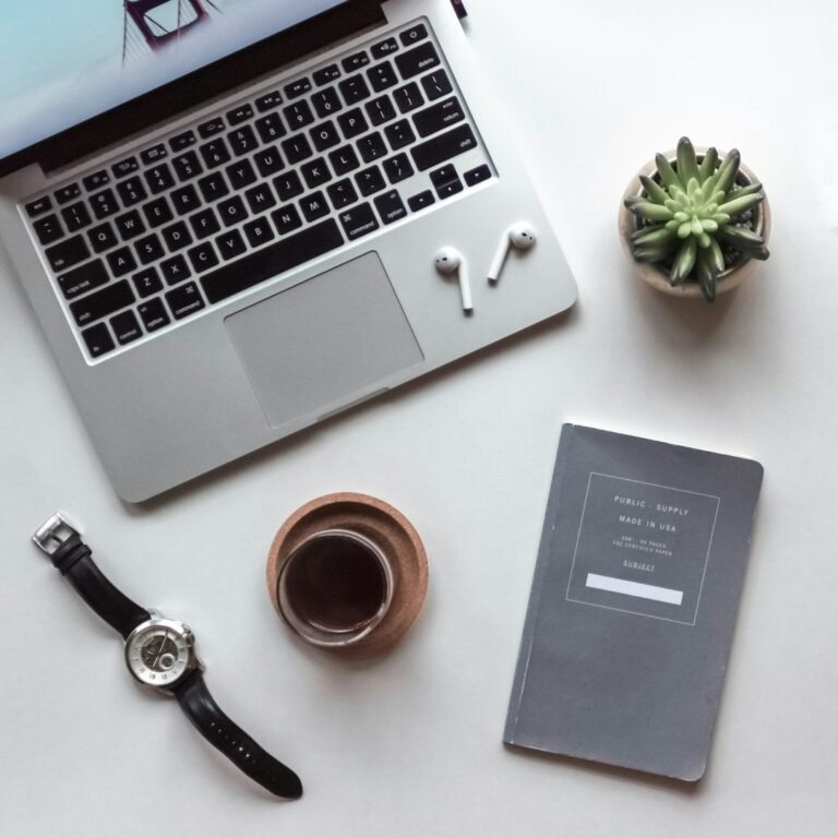 Books, coffee and a calm workspace representing daily self-care for teachers