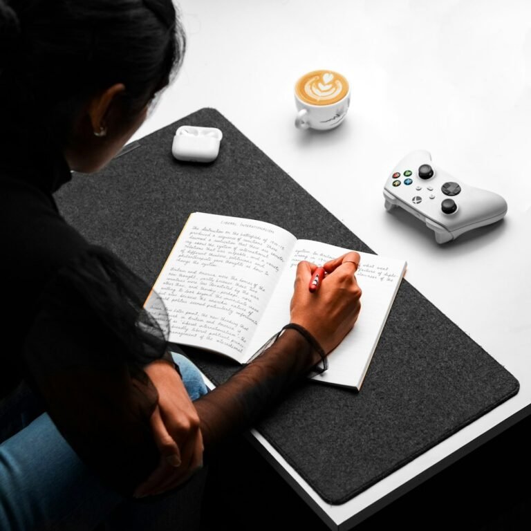 Notebook and desk image for a needs, wants and personal resources life skills lesson