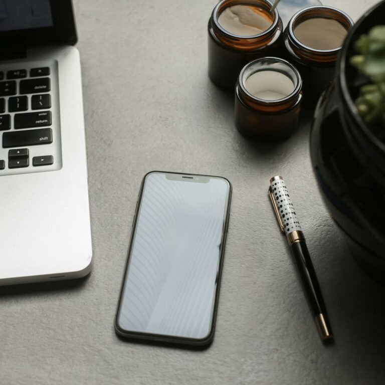 Laptop and pen for a classroom poetry activity