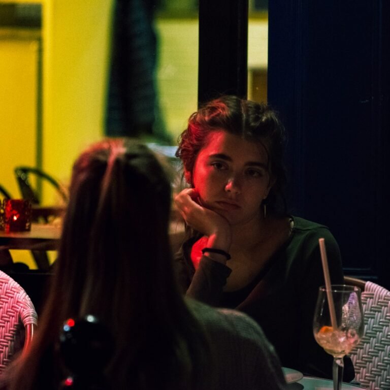 Two people having a face-to-face conversation to illustrate active listening