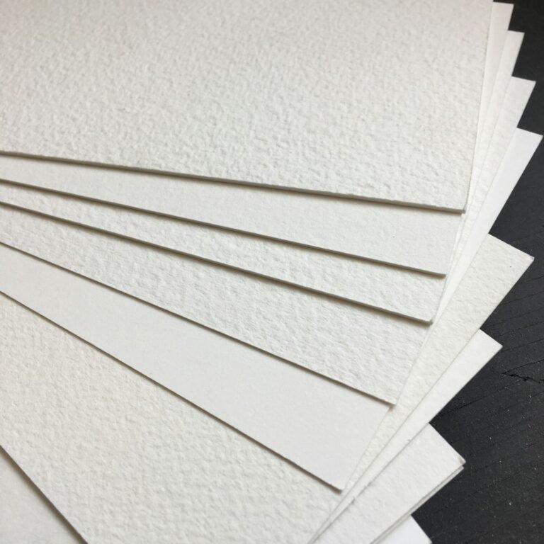 Stack of blank papers for an English exam review lesson