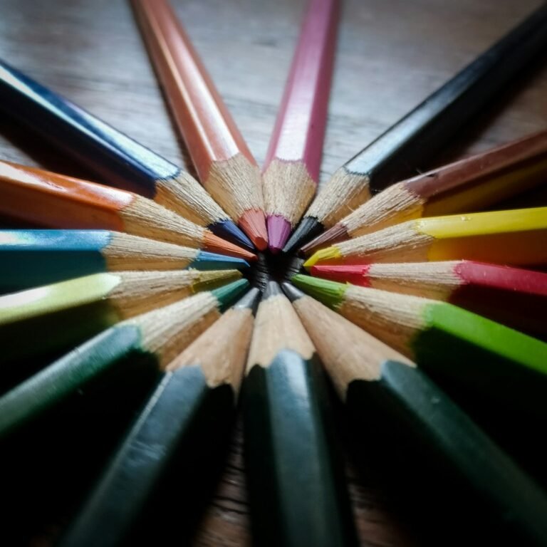 Colorful pencils arranged together as a symbol of teamwork in classroom review games