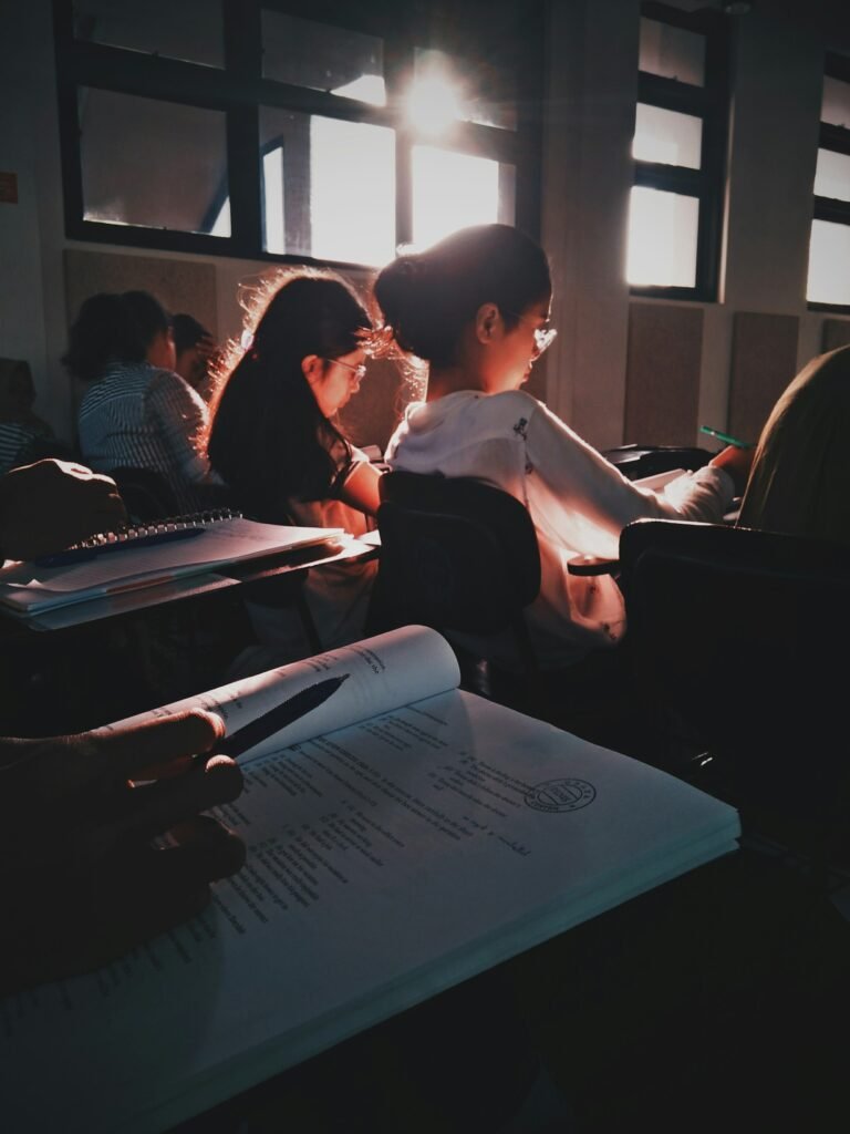 Students reading and recalling prior learning in a classroom